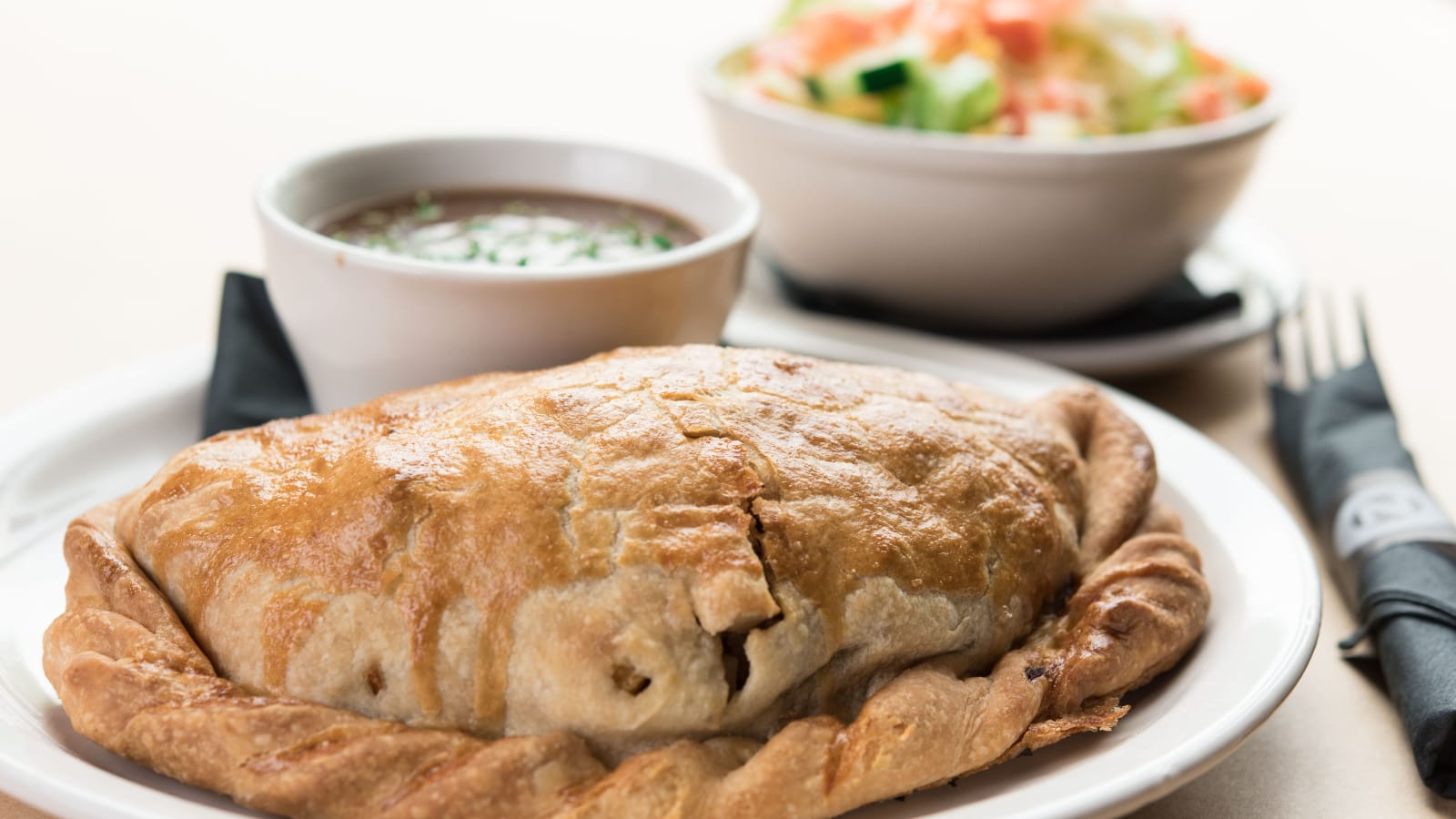 beef pasty with soup and salad