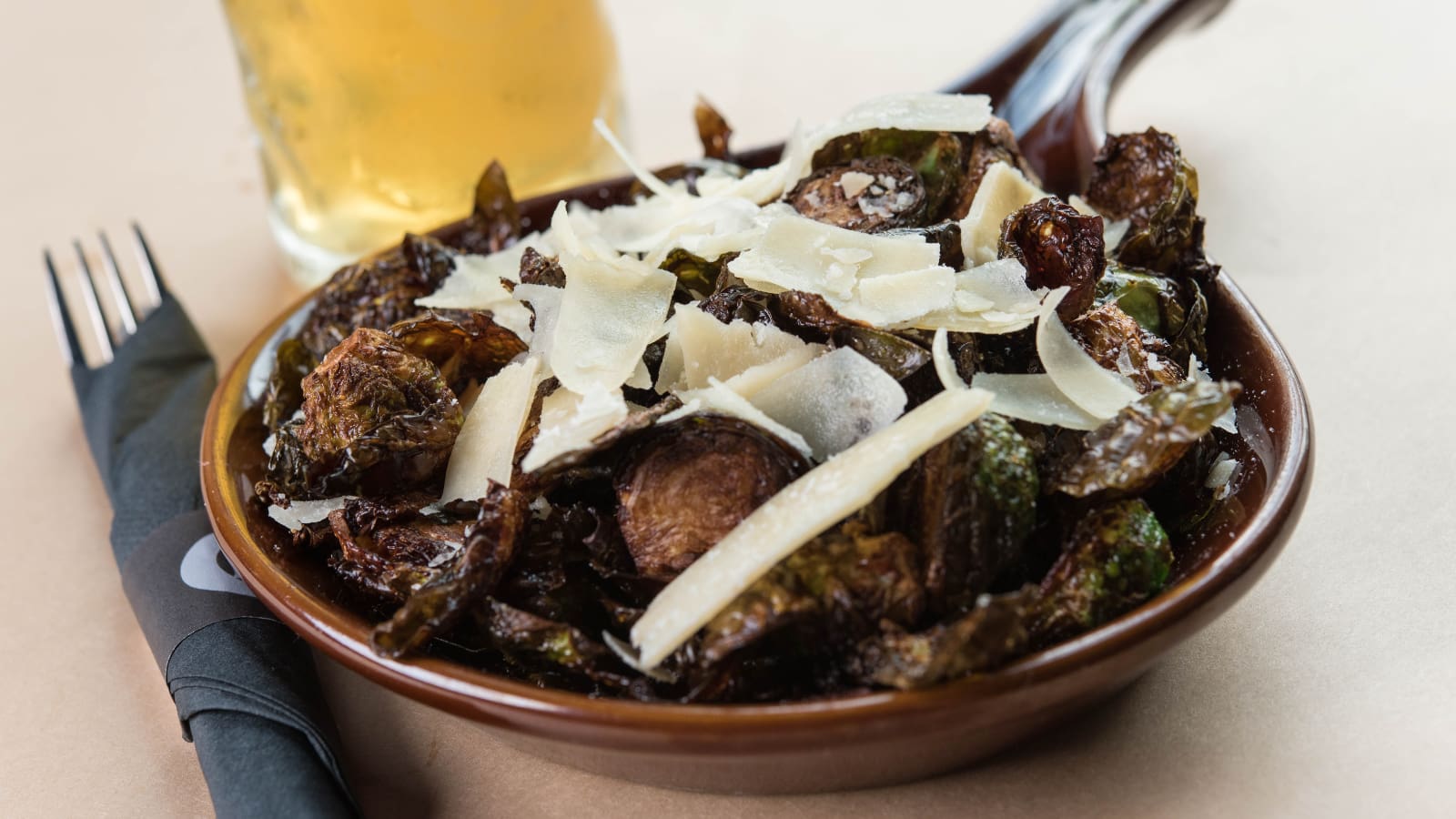 fried Brussels sprouts with shaved parmesan cheese